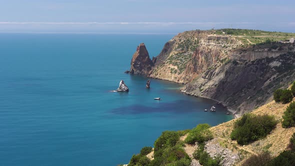 Aerial Panoramic View of Seascape with Crystal Clear Azure Sea and Rocky Shores