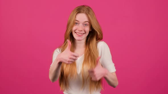 Young Redhead Woman with Freckles Doing Happy Thumbs Up Gesture with Hands