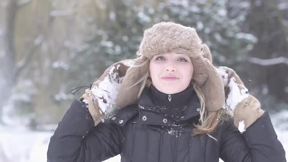 Happiness Lifestyle Portrait of Attractive Female Person Having Fun in Snow Weather