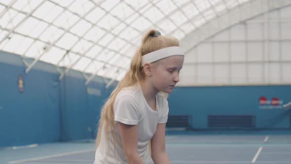 Little Girl On Tennis Training