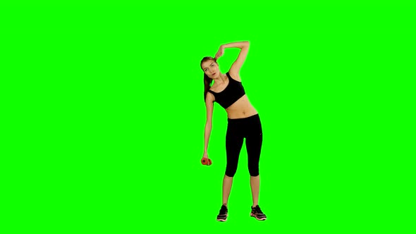 Fitness Woman Working Out with Dumbbell Over Green Screen, Gym