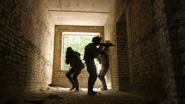 Soldiers Storming Building Occupied By the Enemy alt
