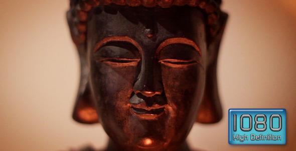 Face of Buddha with Smoke and Candle