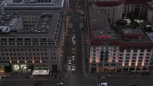 AERIAL: Beautiful View Over Berlin Mitte Office Buildings and Car Traffic City Lights on Cloudy Day