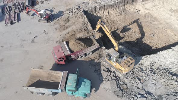 Aerial of an excavator digging a foundation