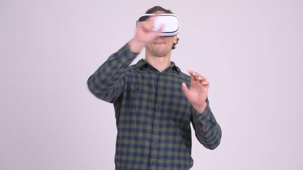 Handsome Hipster Man Using Virtual Reality Headset