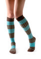Young woman legs posing with turquoise striped socks - PhotoDune Item for Sale