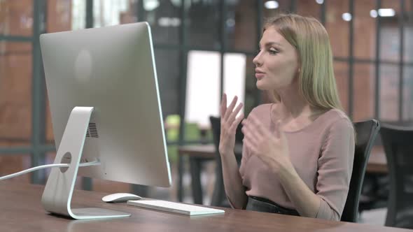 Working Woman Doing Video Chat on Computer