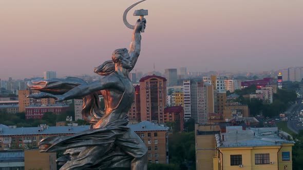 A Soviet Sculpture with Skyscrapers in the Background