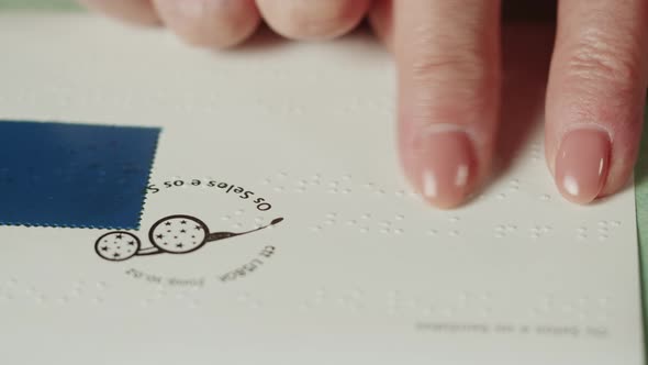 Blind Woman Reading Postcard Braille Using Fingers Closeup Poorly Seeing Female Person Learning to