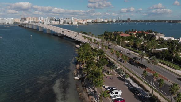 High-speed aerial backward from Bird Key in Sarasota, Florida. Great view of the John Ringling cause