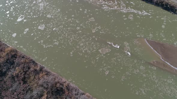 Aerial view flowing ice floating down the Colorado River