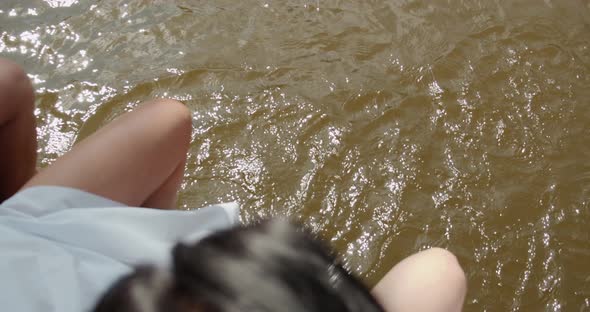 Legs Of Girls Splashing In The Water 