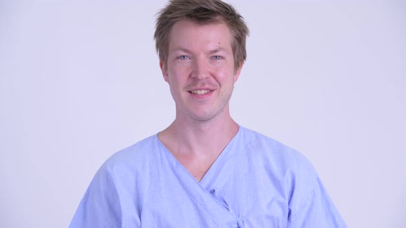 Face of Happy Young Man Patient Smiling