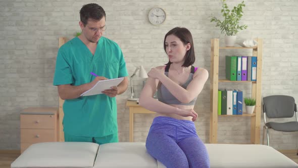 Young Woman Doctor's Chiropractor Osteopath Complains Pain Forearm