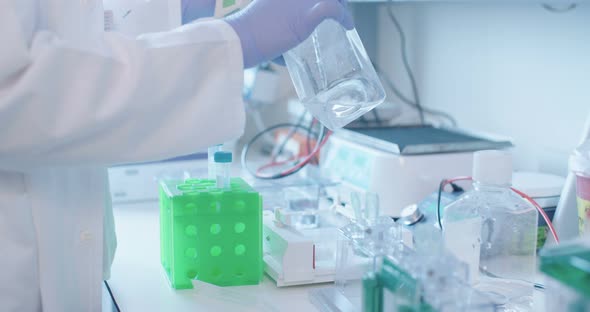 Scientist working in a hospital medical laboratory conducting experiments