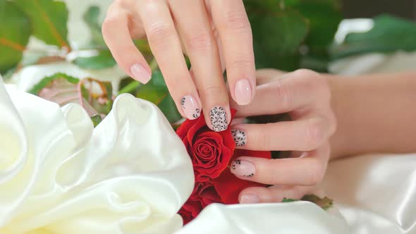 Hand Caress Roses on White Silk