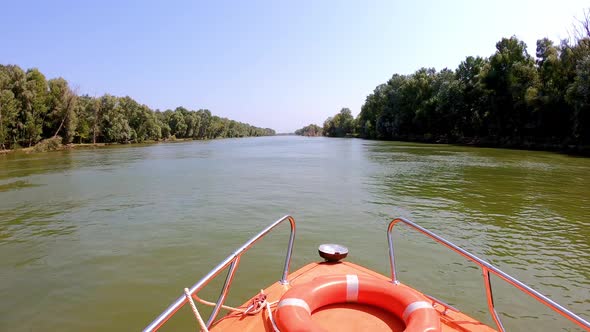 High Speed Boat Navigating in the Sfantu Gheorghe arm of Danube River, Romania