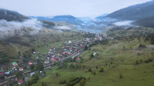 Aerial View of the Village in the Carpathian Mountains in Autumn. Ukraine