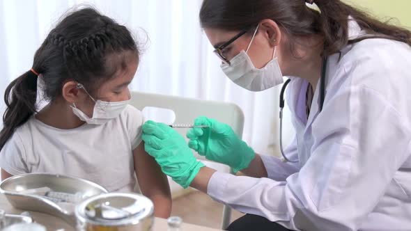 School Girl Visits Skillful Doctor at Hospital for Vaccination