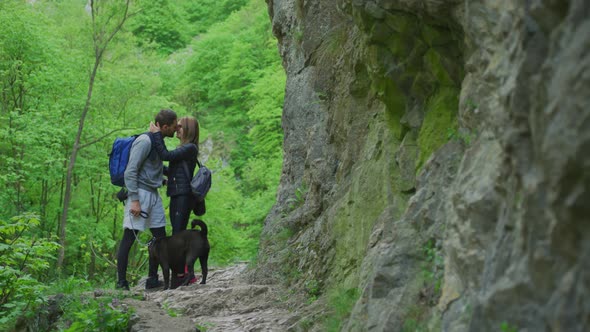 Couple in love kissing while hiking