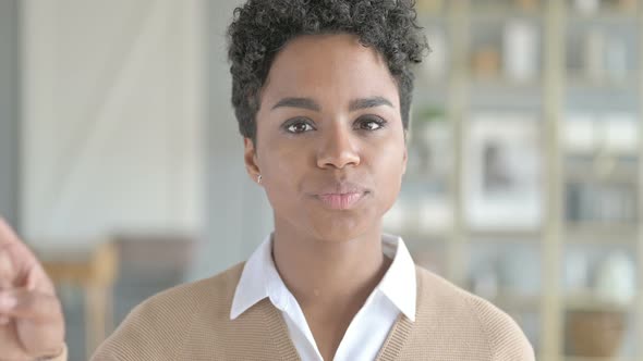 Portrait of African Girl Showing No Sign with Her Finger