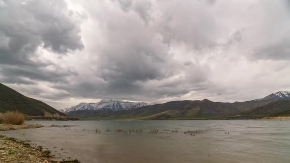 Timelapse of clouds moving over Deer Creek Reservoir in Utah