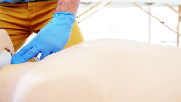 Male paramedic during cardiopulmonary resuscitation training