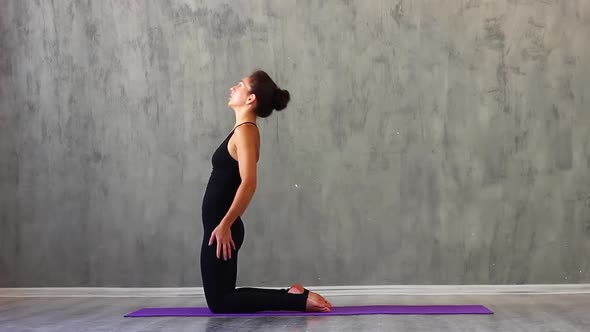 Woman Clothes Performs Gymnastic Stretching Purple Yoga Mats Against Backgroun