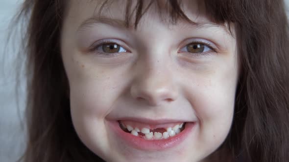 Child with clean teeth.