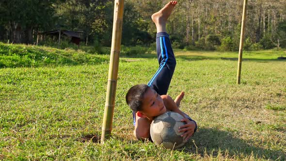 Rural Boy Goalkeeper Save A Goal