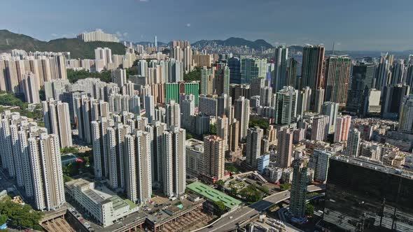 Aerial riser reveals high concentration of skyscrapers, Tsuen Wan, Hong Kong