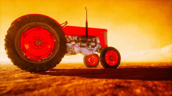 Vintage Retro Tractor on a Farm in Desert