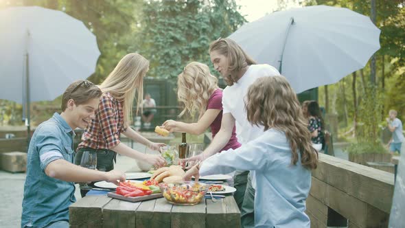 People Eating Healthy Food On Outdoor Party