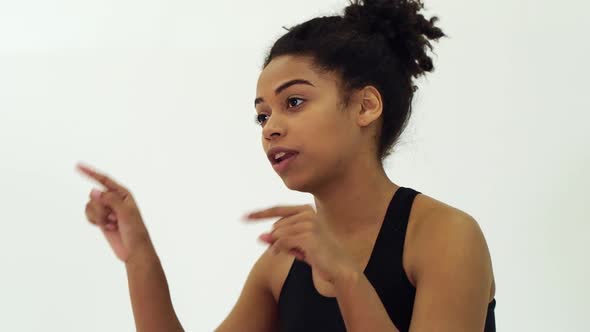 Black Woman Fitness Coach Giving Instructions