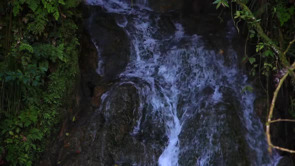 Water flows down a mountain or cliff in Puerto Rico.