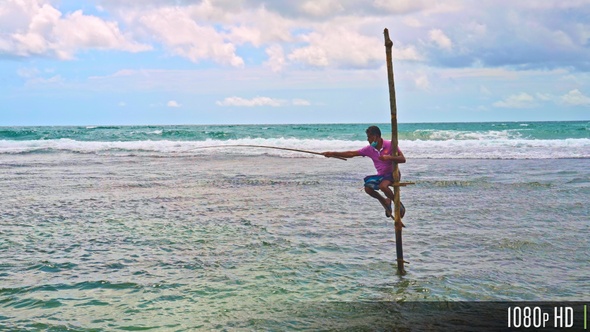 Sri Lankan Stilt Fisherman During the Day with Seascape Ocean View