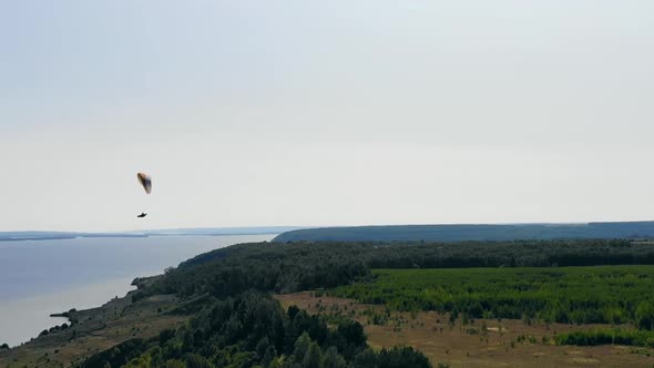 Flight on the Ram-air Parachute Above the Land