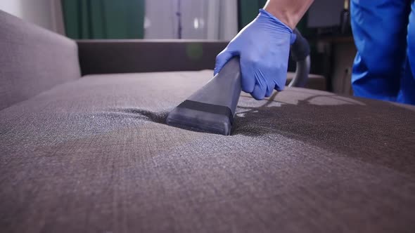 Home and Office Cleaning Concept. Professional Wet Sofa Cleaning