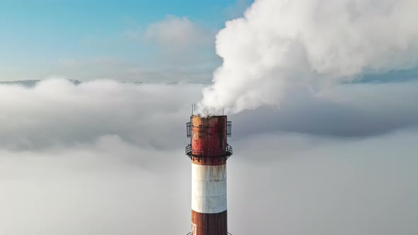 Aerial drone view of Chisinau. Tube of the thermal station with smoke coming out