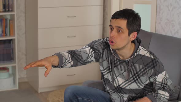 Football Fan Watching Soccer on Tv and Celebrating Victory