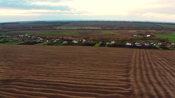 Flying Over an Green Empty Field