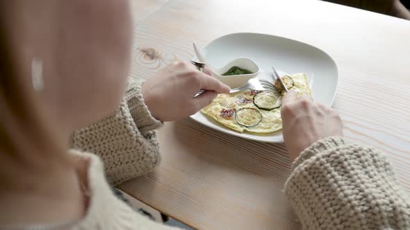 Close Up Lifestyle Image of Woman Starting Eat Her French Tasty Breakfast Contains Scramble Eggs