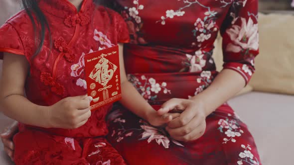 Mother and Daughter Celebrating Chinese New Year