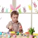 Happy Child Wearing Bunny Ears Painting Eggs on Easter Day - VideoHive Item for Sale