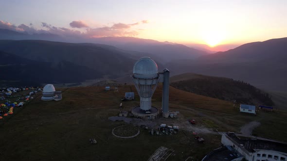 Two Large Telescope Domes at Sunset