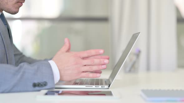 Close Up of Businessman Closing Laptop Feeling Frustrated