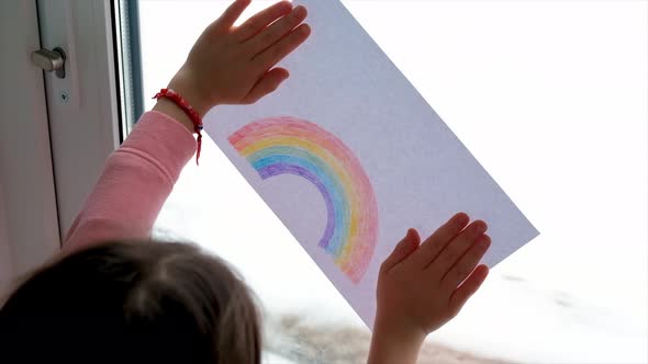 The Child Painted a Rainbow on the Window