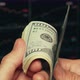Trader checking and counting dollar banknotes - VideoHive Item for Sale