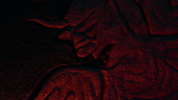 Scary Demon Stone Carving In Fire Light alt